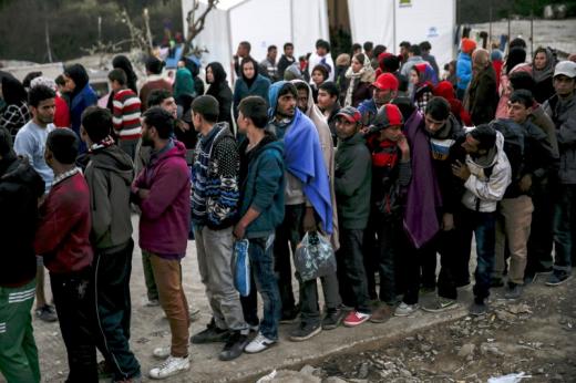 Fire destroy a refugee camp in Greece, thousands flee to safety