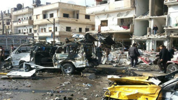 Syria: Military top chief among dozens killed in suicide attacks in Homs